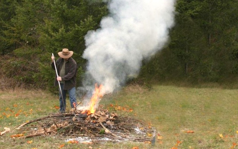Garden bonfire burning rubbish and garden waste